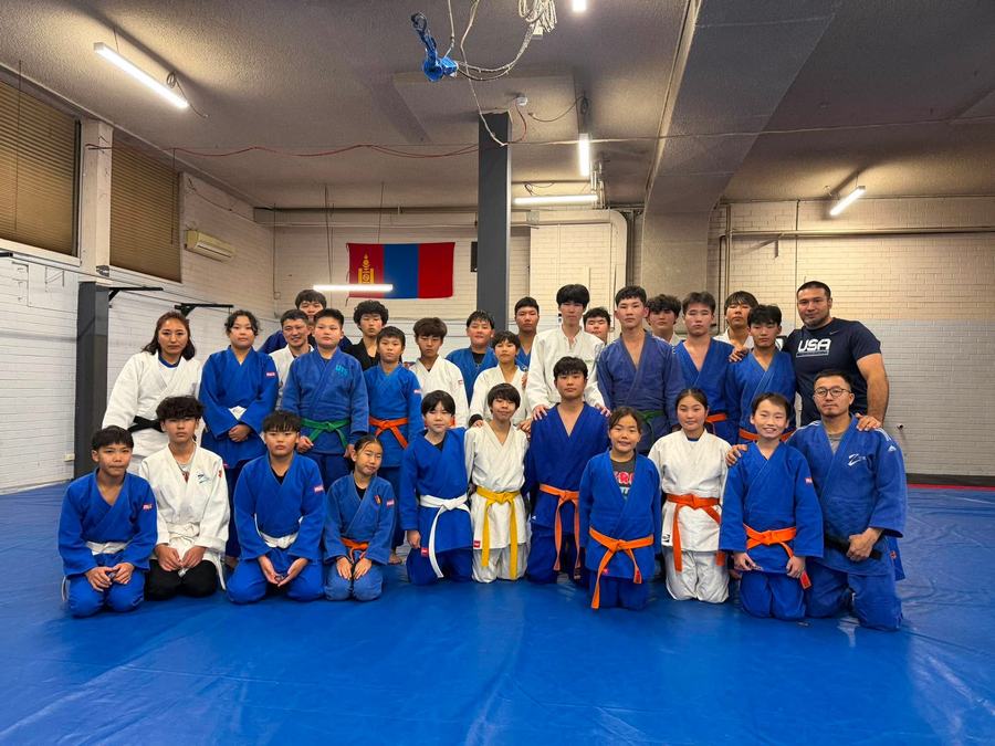 U Champ students with visiting coach